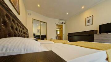 Фото номера Трехместный номер Гостиница Анастасия г. Туапсе 11