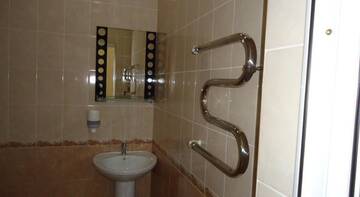 Фото номера Стандартный трехместный номер Гостиница Теплый номерок Гостевой дом г. Туапсе 4