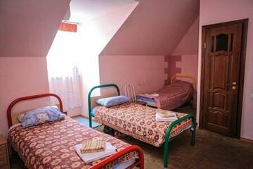 Фото номера Просторный двухместный номер с 2 отдельными кроватями Гостевой дом Магнолия г. Туапсе 2