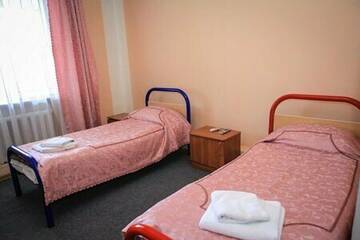 Фото номера Двухместный номер с двуспальной кроватью и дополнительной кроватью Гостевой дом Магнолия г. Туапсе 2