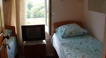 Фото номера Двухместный номер эконом-класса с 2 отдельными кроватями Гостевой дом  Чайка г. Туапсе 3