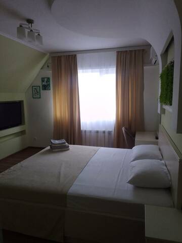 Фото номера Номер делюкс комфорт с 1 двуспальной кроватью Гостиница Олимп г. Туапсе 2