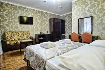 Фото номера Стандартный трехместный номер Гостиница Rosa Del Viento г. Туапсе 15