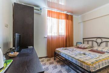 Фото номера Улучшенный двухместный номер с 1 кроватью Гостиница Del Mar г. Туапсе 3